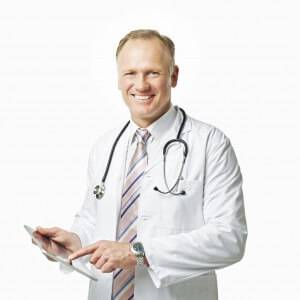 Photo of smiling doctor to illustrate healthcare IT business computer network services