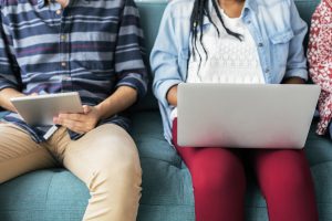 teens on tablet and laptop Back To School Tech Safety